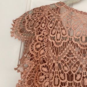 Adelyn Rae Lace with a lovely drape over the edge of shoulders